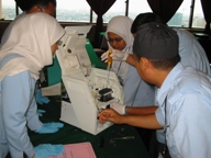 Malaysian biomeds repairing equipment